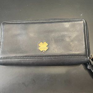 Lucky Brand zip around two compartment black leather wallet w/brasstone hardware
